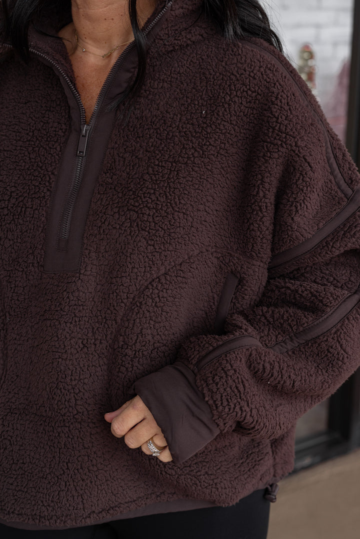Women's espresso sherpa quarter zip pullover jacket with espresso trim by Rae Mode showing sleeve details