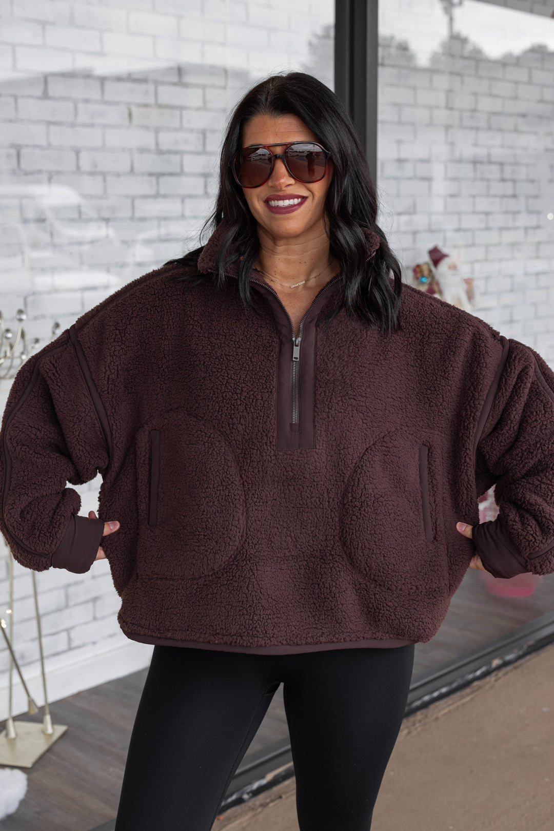 Women's espresso sherpa quarter zip pullover jacket with espresso trim by Rae Mode showing relaxed fit