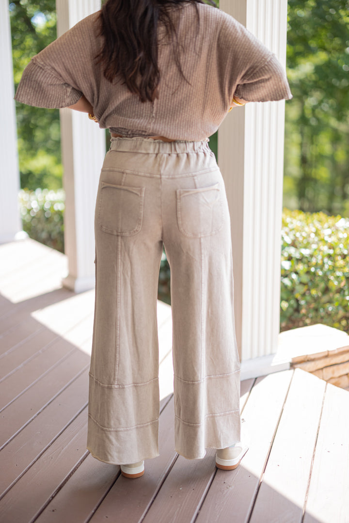 French terry knit wide leg pants in mineral washed mushroom taupe by Easel showing back view