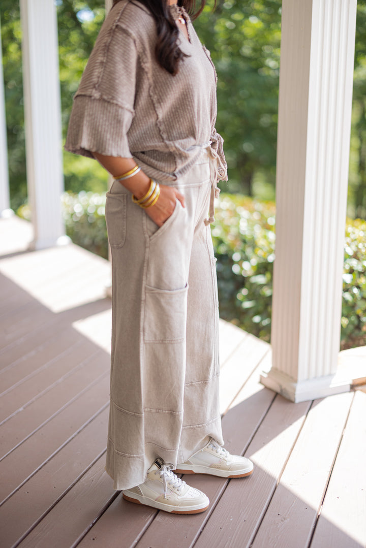 French terry knit wide leg pants in mineral washed mushroom taupe by Easel showing side view