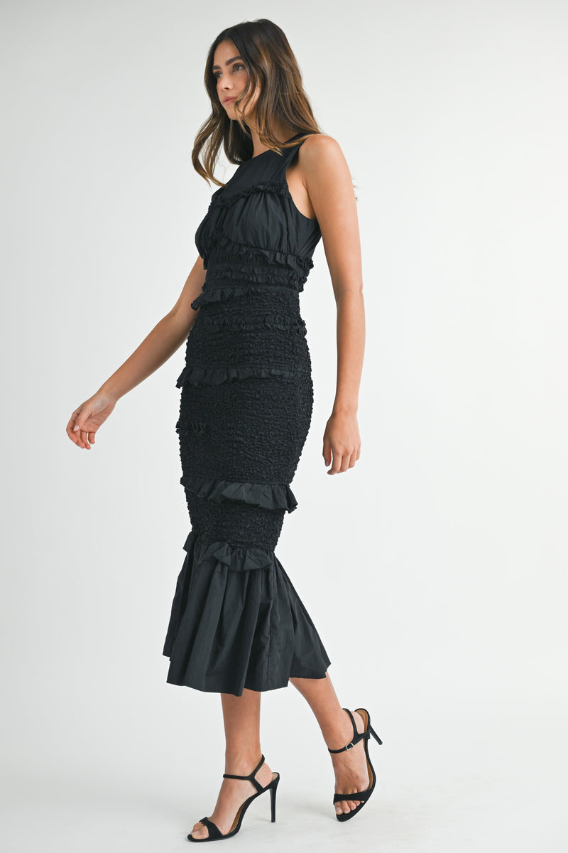 smocked black ruffled midi dress