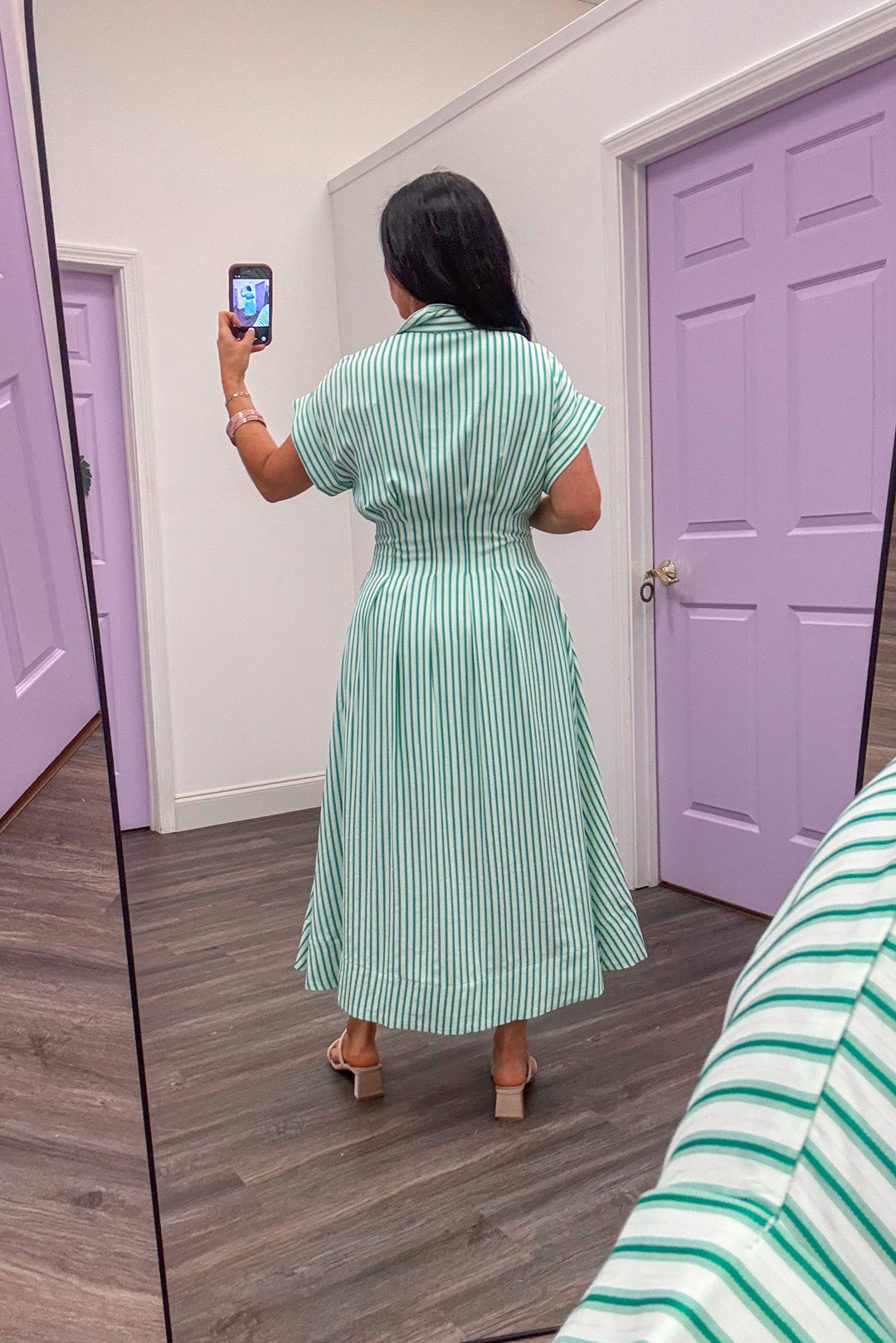 Women's green and ivory striped button front midi dress with flowy skirt by Entro