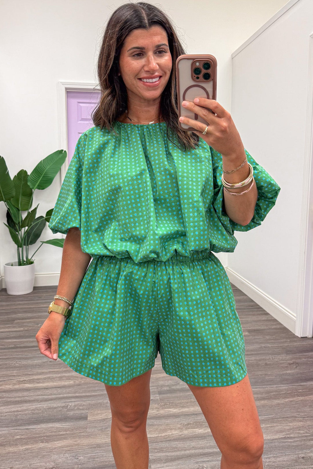 green with small blue polka dot print bubble hem semi-cropped cotton poplin top
