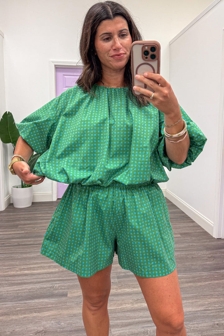 green with small blue polka dot print bubble hem relaxed silhouette semi-cropped top