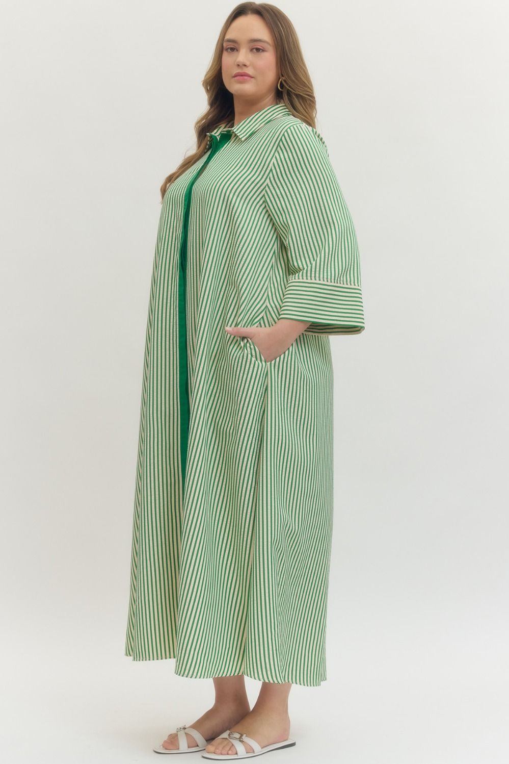 Women's striped green maxi dress by Entro in plus size showing slight side view