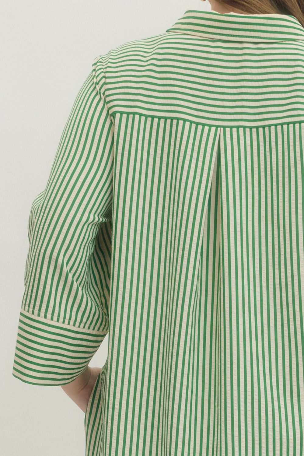 Women's striped green maxi dress by Entro in plus size showing close up back view