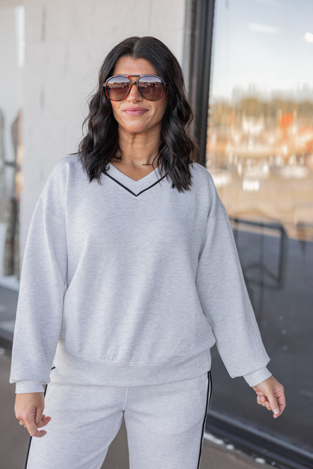 Women's grey and black striped piping scuba knit top by Rae Mode