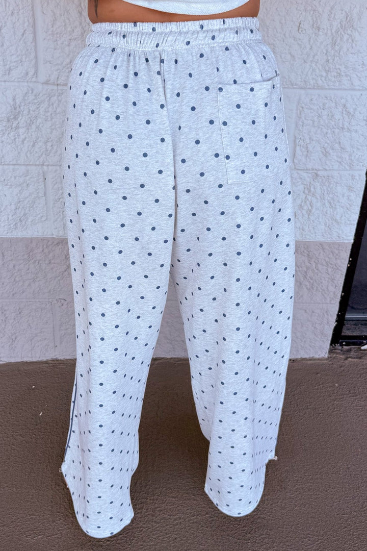 washed heather grey with navy polka dot print wide leg knit jogger pants with one back pocket