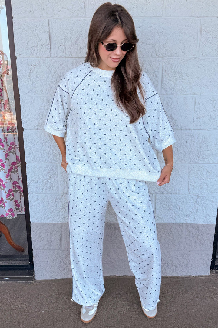 washed heather grey with navy polka dot print short sleeve terry knit top with ribbed bottom hem