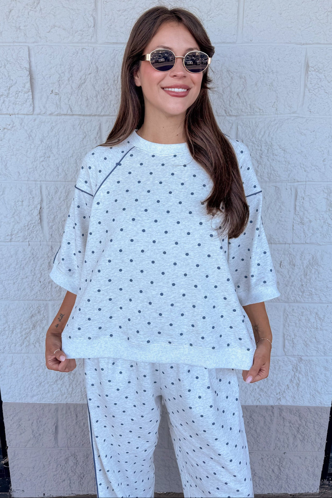 washed heather grey with navy polka dot print short sleeve crew neckline terry knit top