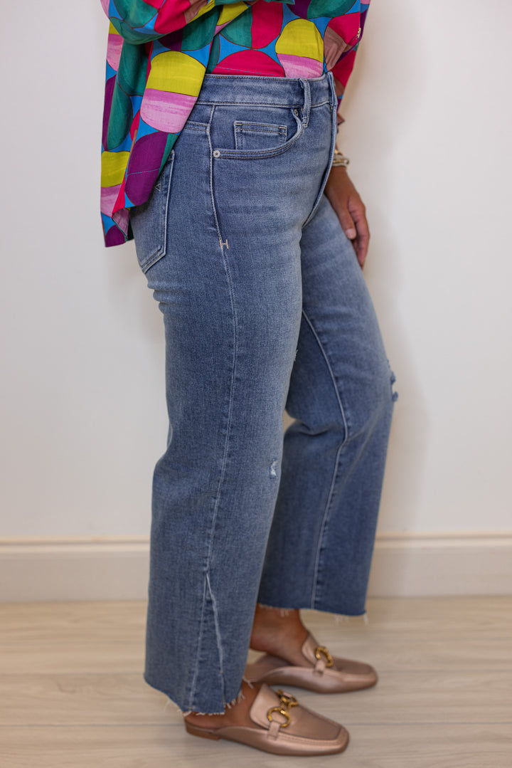 Hidden Jeans Tracy hem slit cropped straight jeans in medium dark denim showing side view
