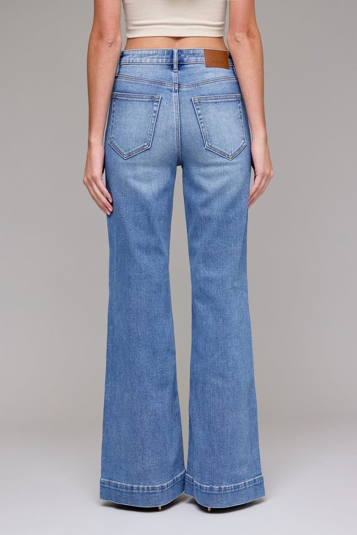 Hidden Jeans Happi comfort flare jeans in medium dark wash with pintuck detail showing full back view