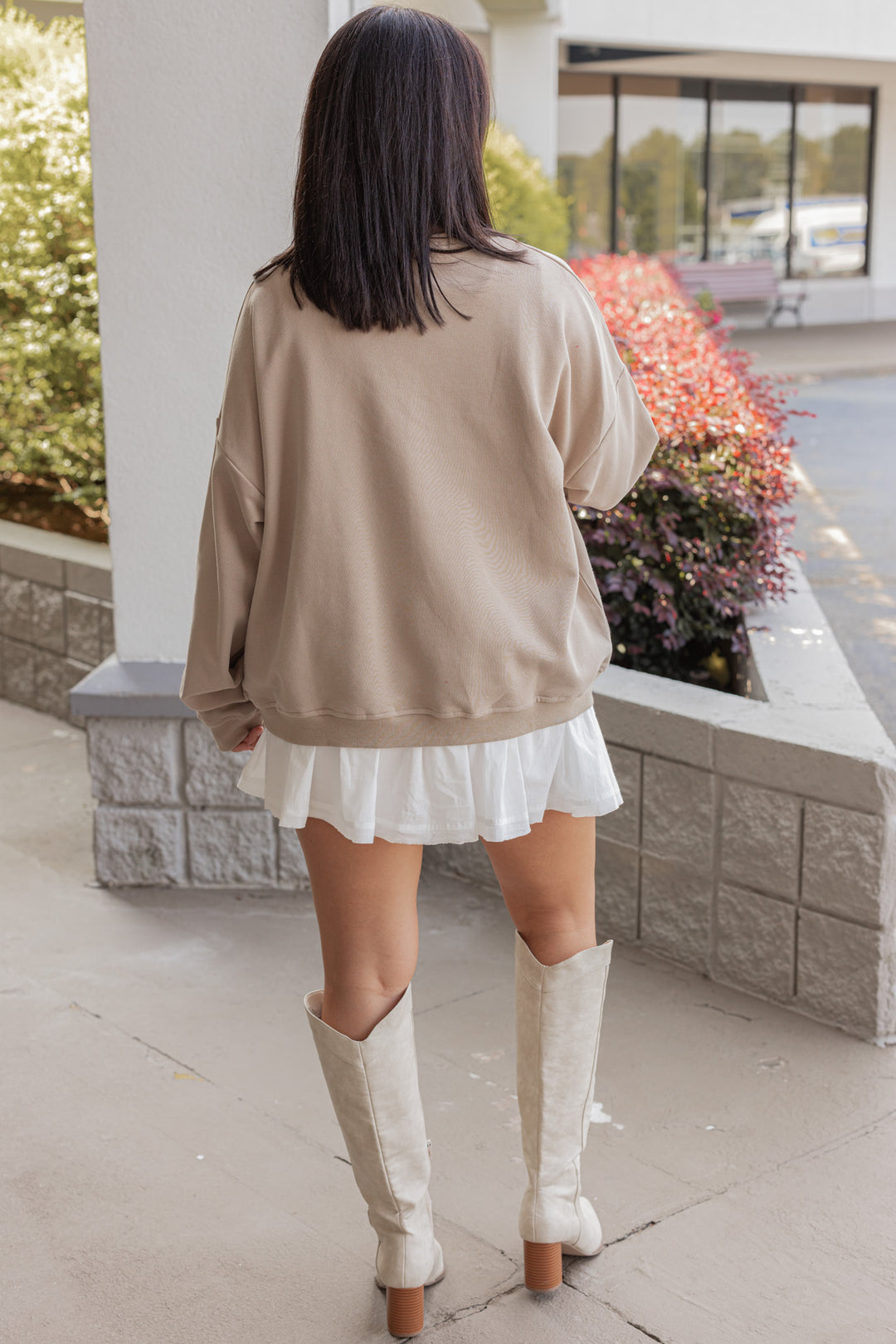 Women's taupe terry knit pullover sweatshirt with a white horseshoe on front by Wishlist showing full back view