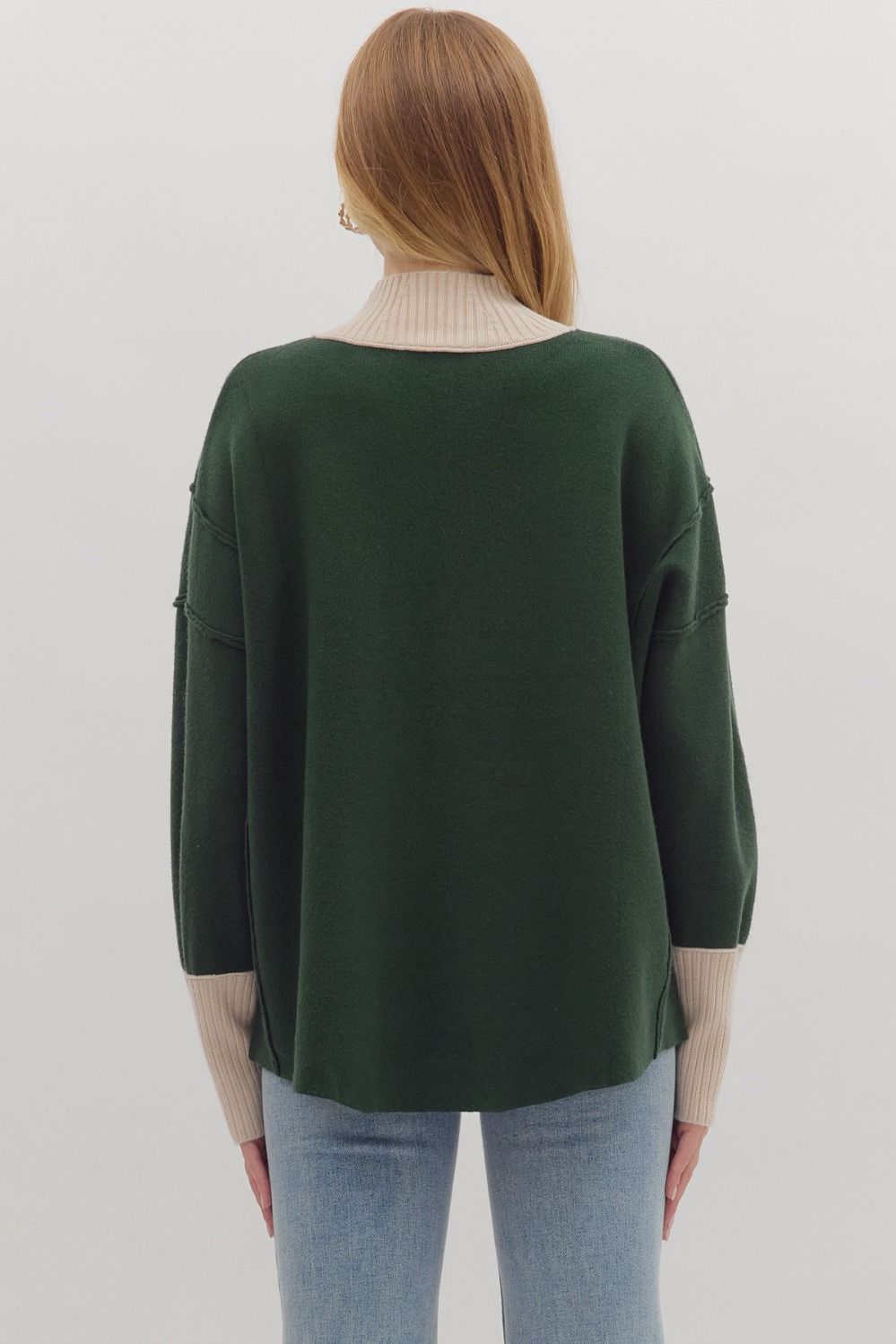 Women's hunter green sweater knit pullover top with cream ribbed trim by Entro showing back view