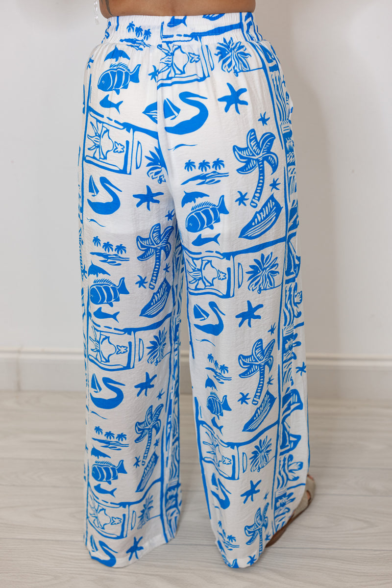 white blue tropical printed linen palazzo pants