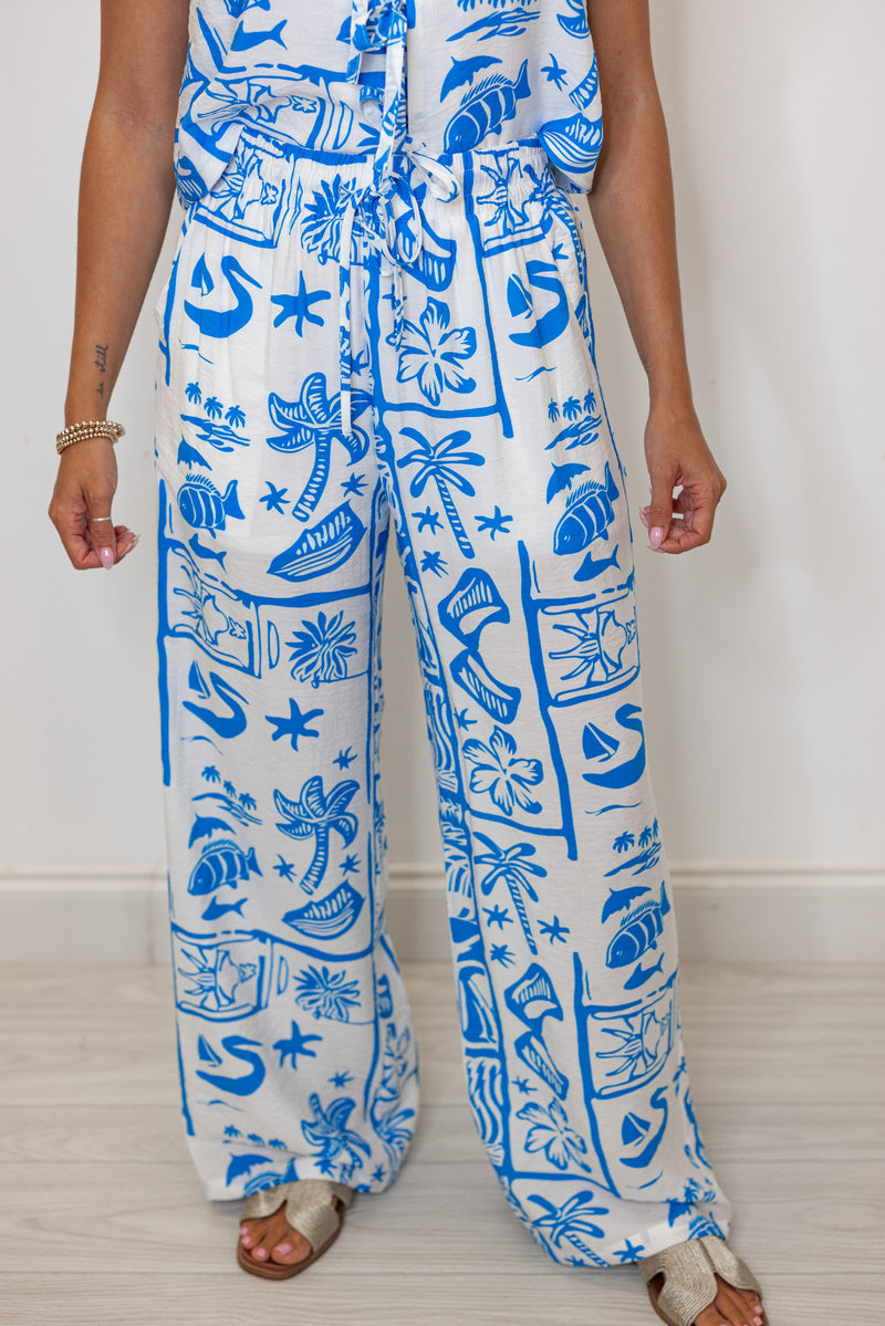 white blue tropical printed linen palazzo pants