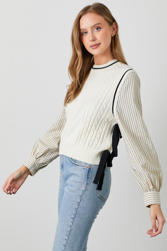 Polagram BaeVely Ivory and black sweater vest with bow tie details over faux ivory and black top