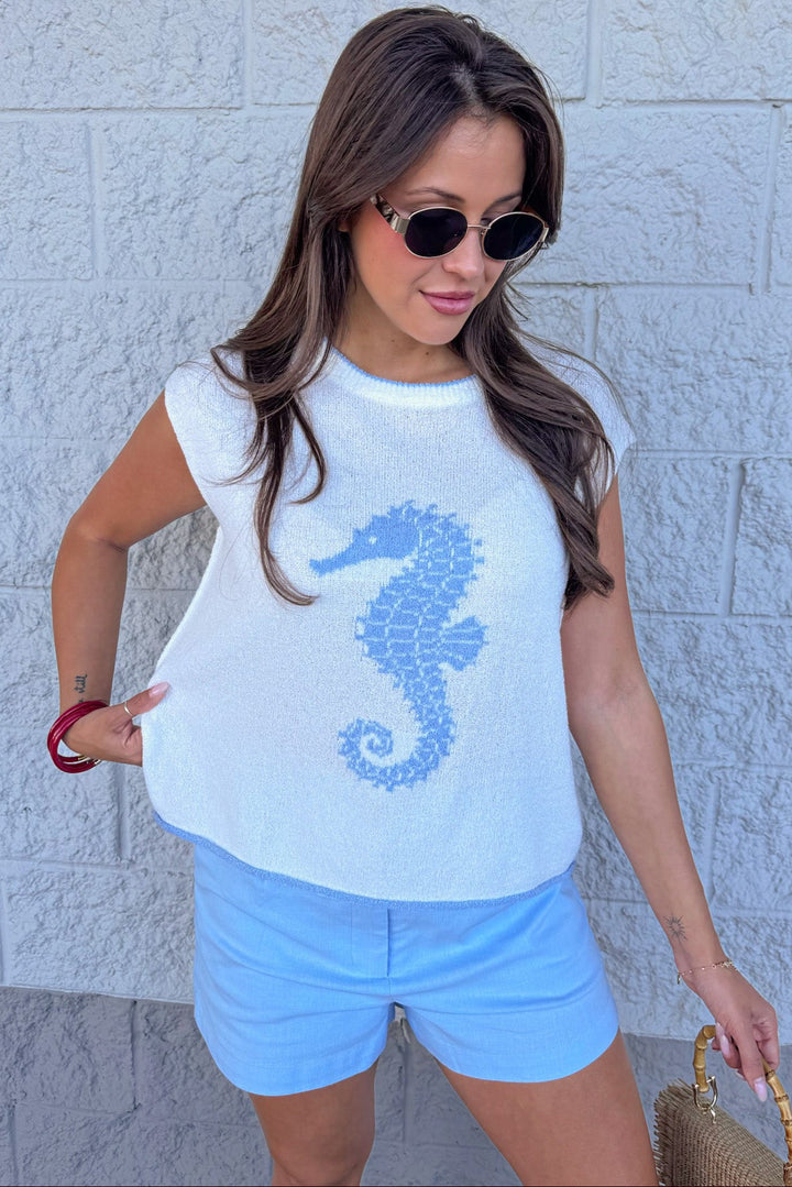 ivory with light blue seahorse detail rolled bottom hem sleeveless knit top
