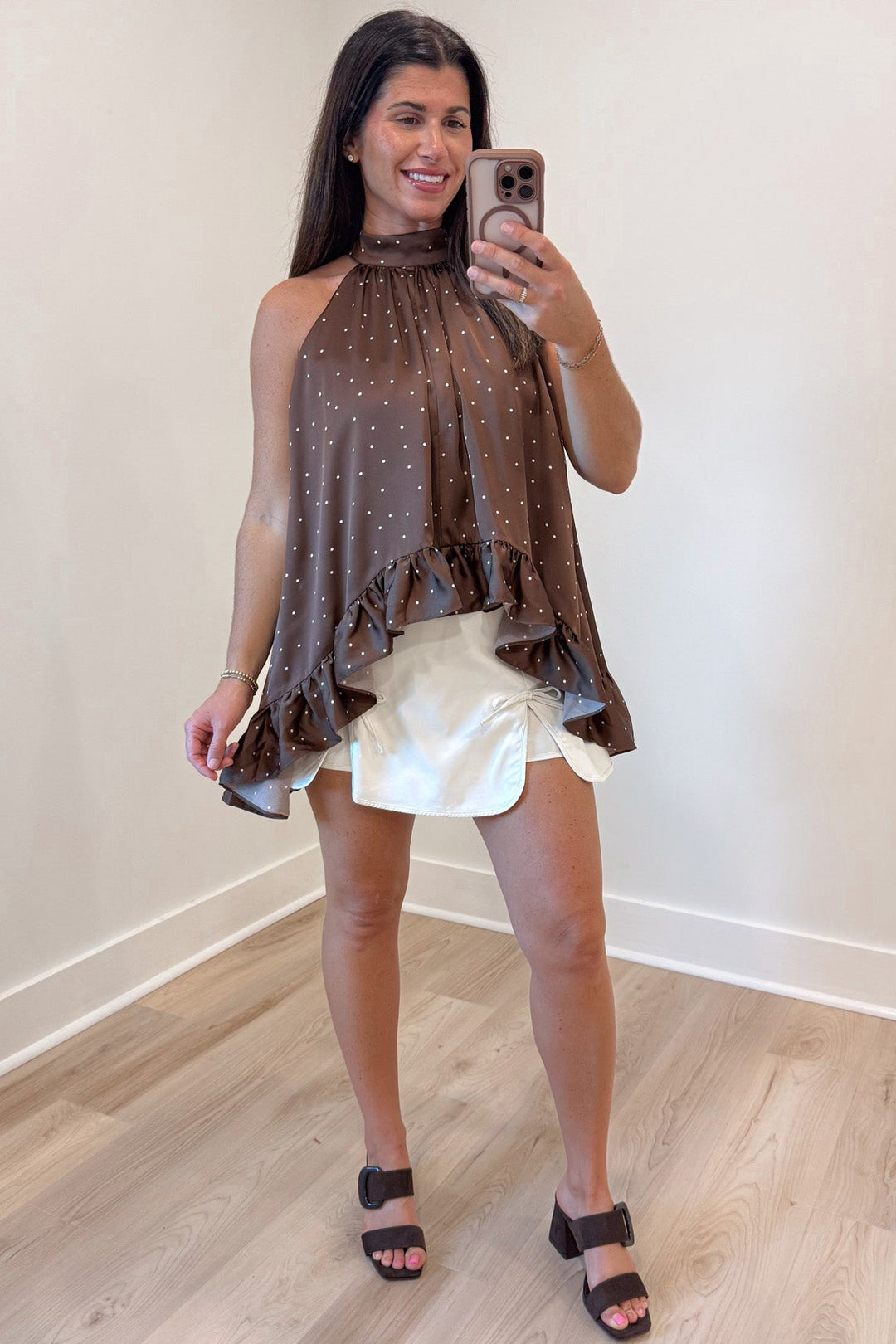 solid ivory faux leather mini skort with bow tie accent details