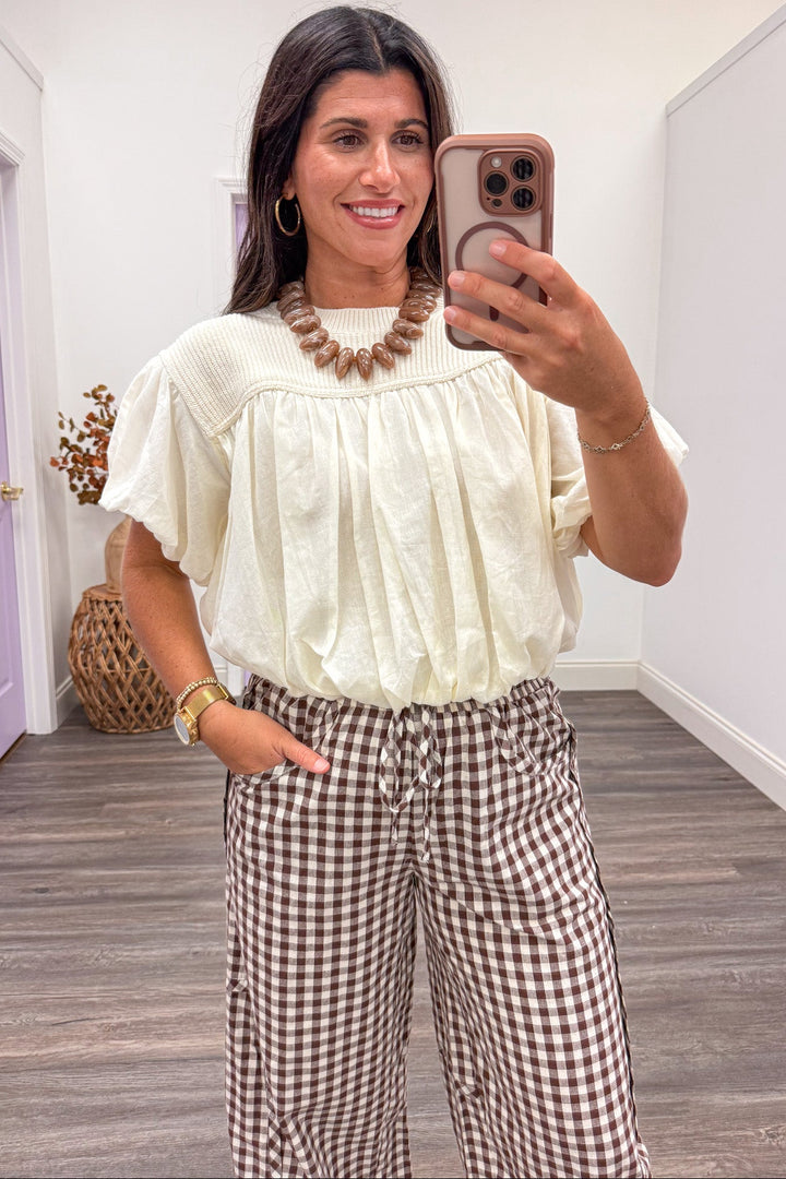 solid ivory puff sleeve bubble hem ribbed sweater and woven fabric semi-cropped top
