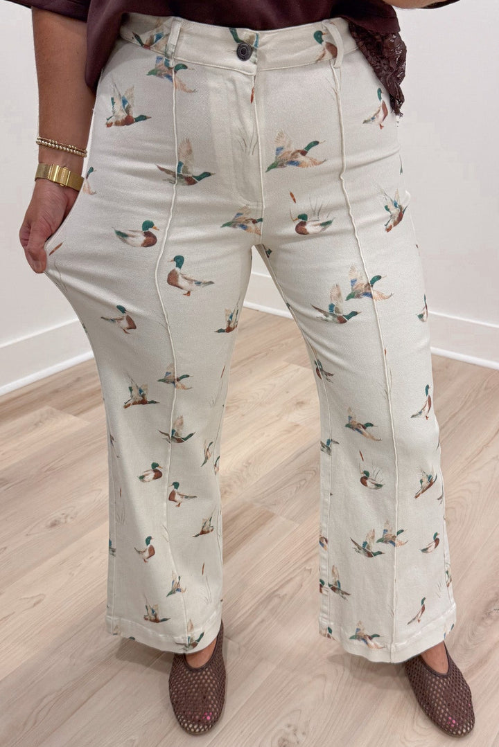 washed ivory with printed mallard ducks twill denim wide leg pants with pintuck seam details