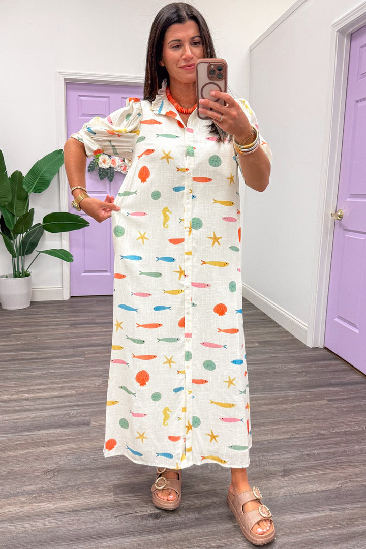 ivory with multicolored fish and seashell print relaxed silhouette button front maxi dress
