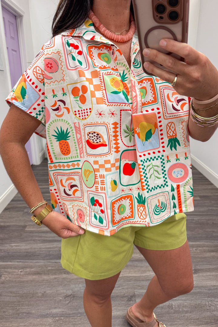 ivory with multi-colored fruit basket print short dolman sleeve v neck cotton top