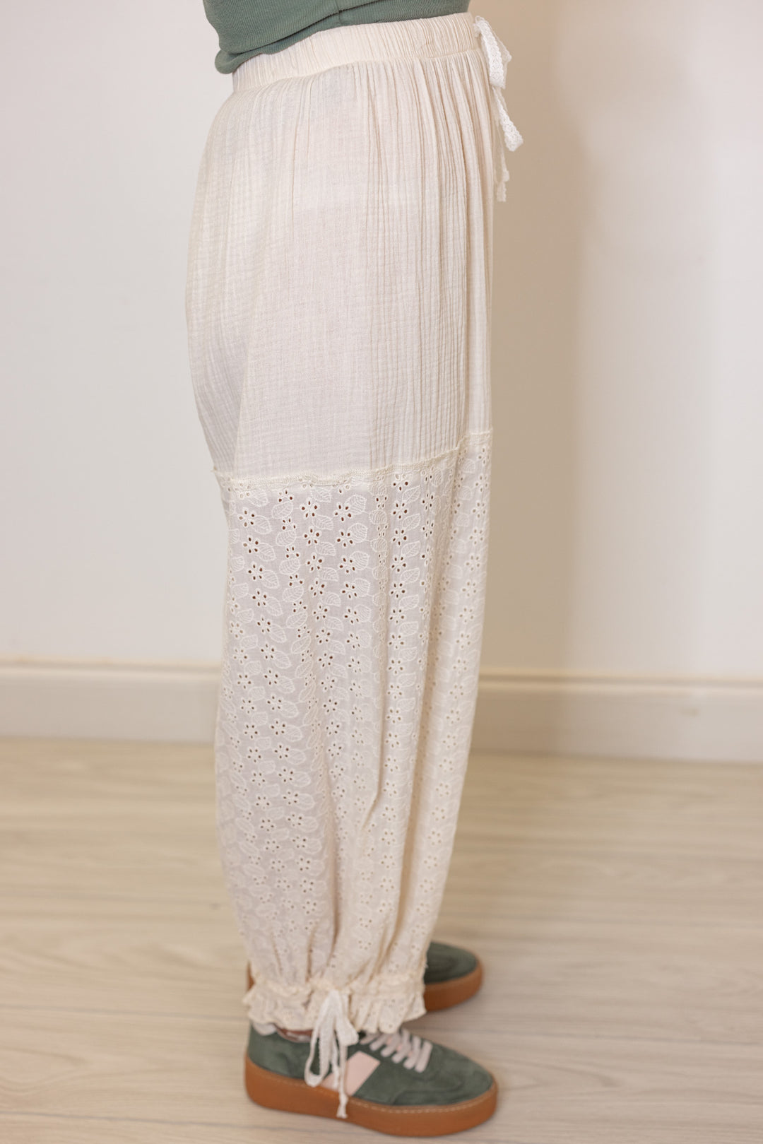 Women's eyelet lace and gauze wide balloon leg jogger pants in natural by POL showing up close side view