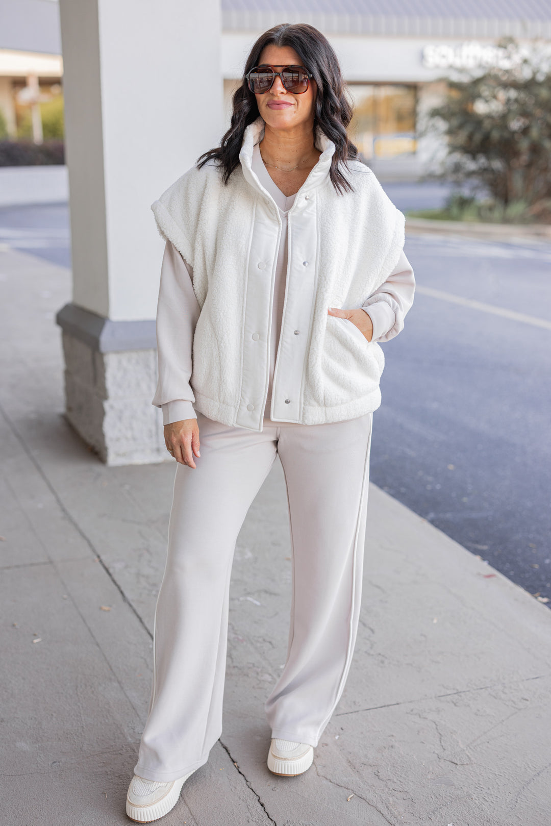 Women's ivory sherpa vest by Rae Mode, showing full front view