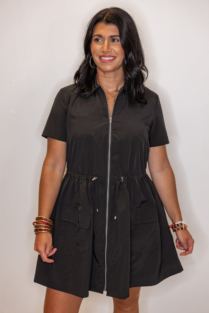 Women's black cinch waist dress by Karlie showing up close front view