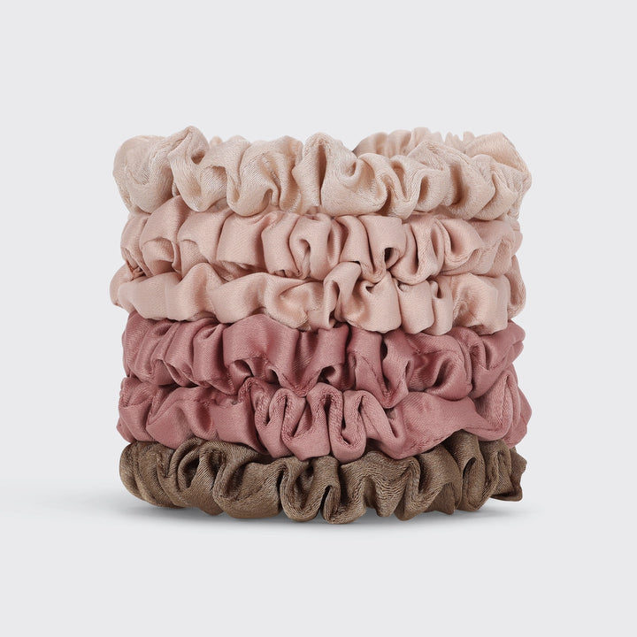 Stack of pink and brown scrunchies 