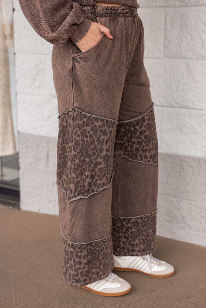 Comfy leopard print black wide leg pants by J. Her showing up close side view