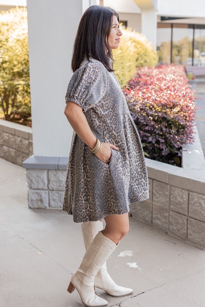 Brown and black washed denim animal print snap front dress with collar by Entro showing side view