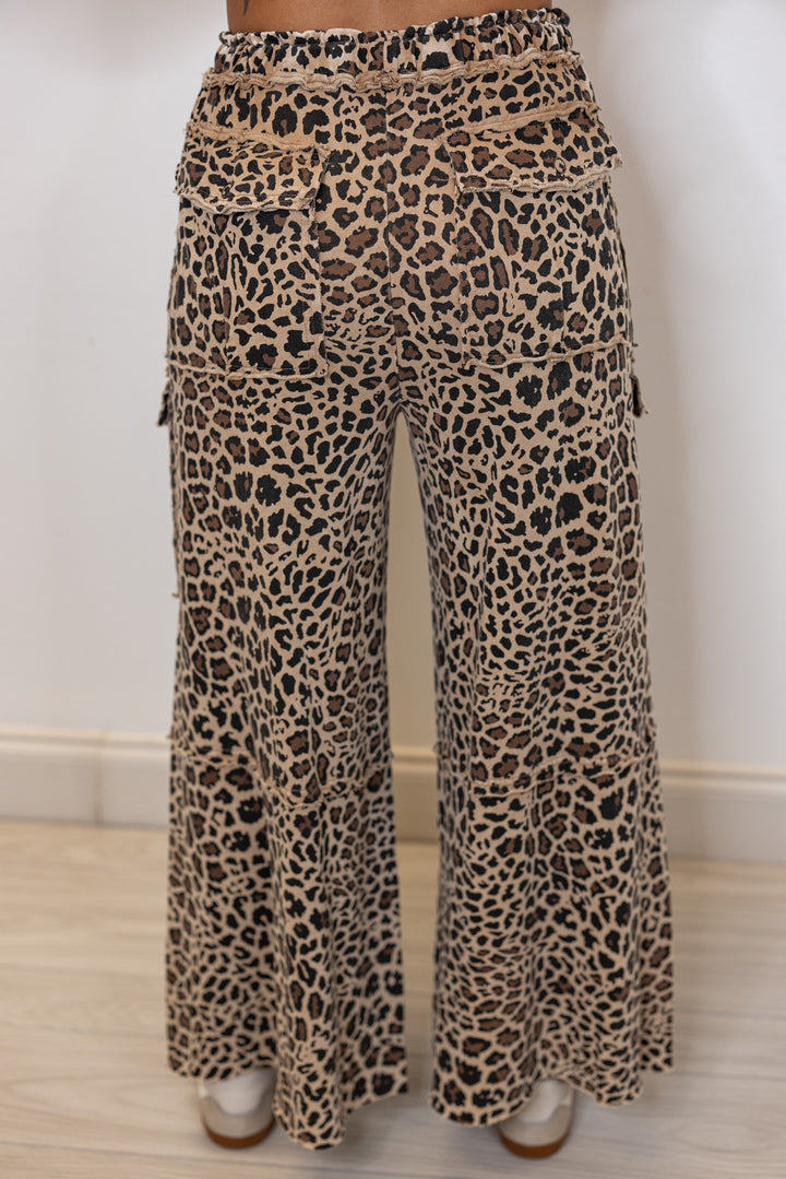 Women's mocha and black leopard print french terry knit wide leg pants by Easel showing up close back view