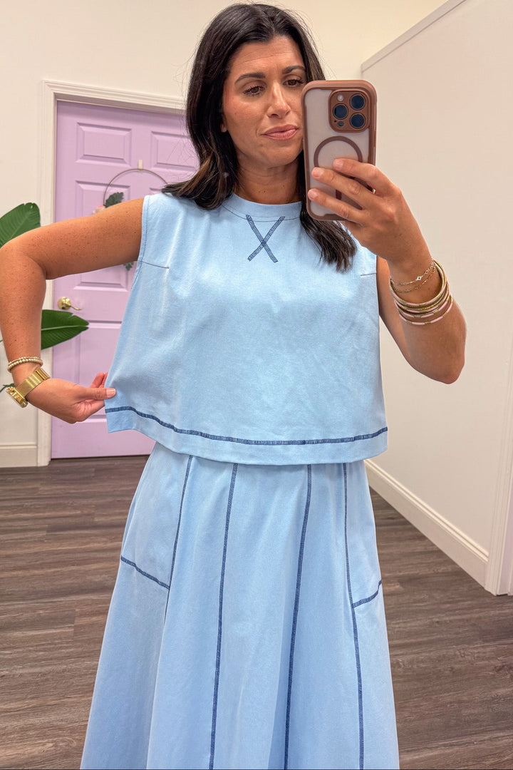 light blue with navy reverse seam details crew neckline top and midi skirt set