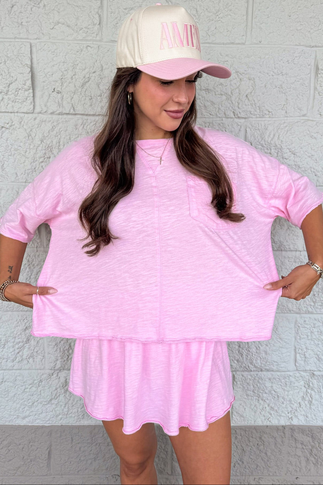 solid light pink relaxed silhouette top and skort matching cotton athleisure set