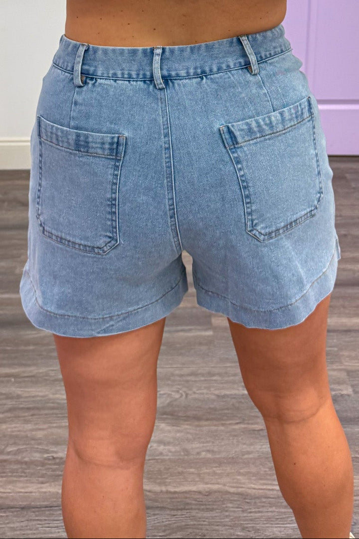 light washed blue denim shorts with back pockets