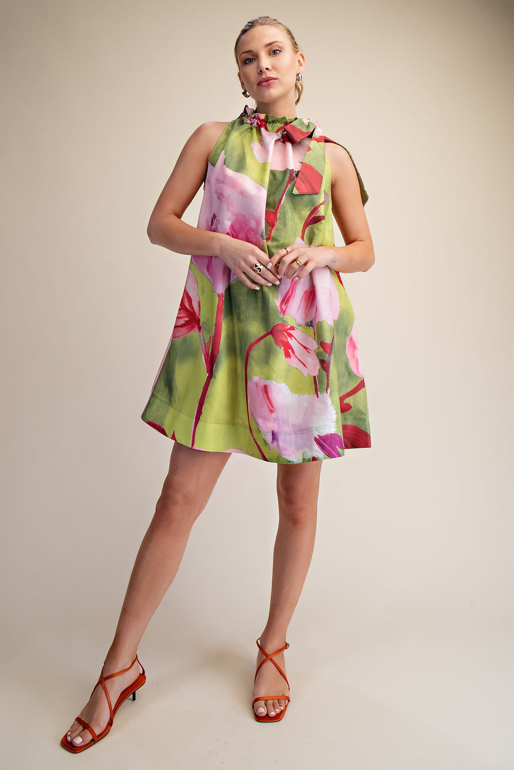Lime and pink floral print mini dress with adjustable drawstring bow tie neck by Glam with matching heels