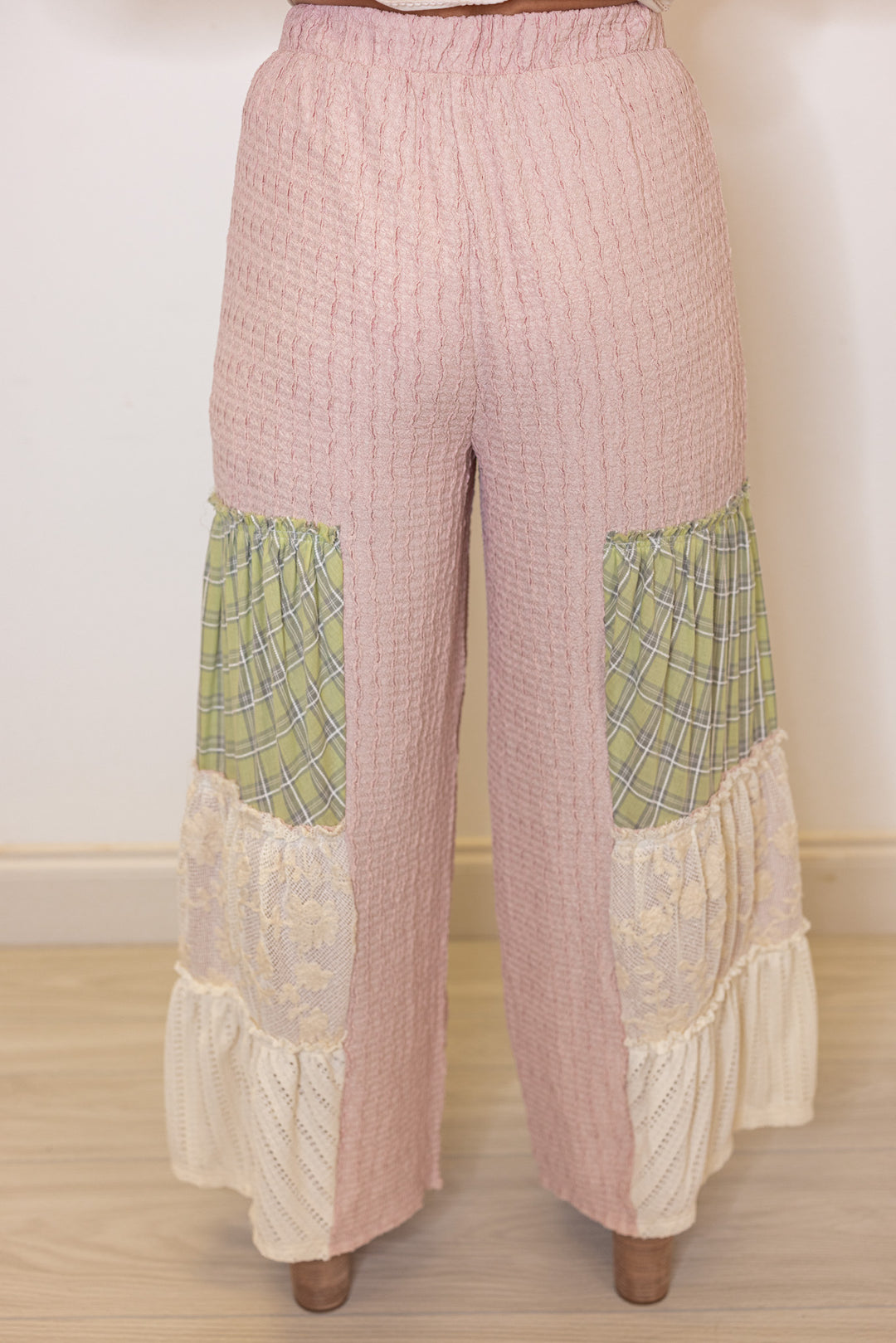 Women's dusty pink wide leg pants with tiered colorblock patches by Fantastic Fawn showing back view