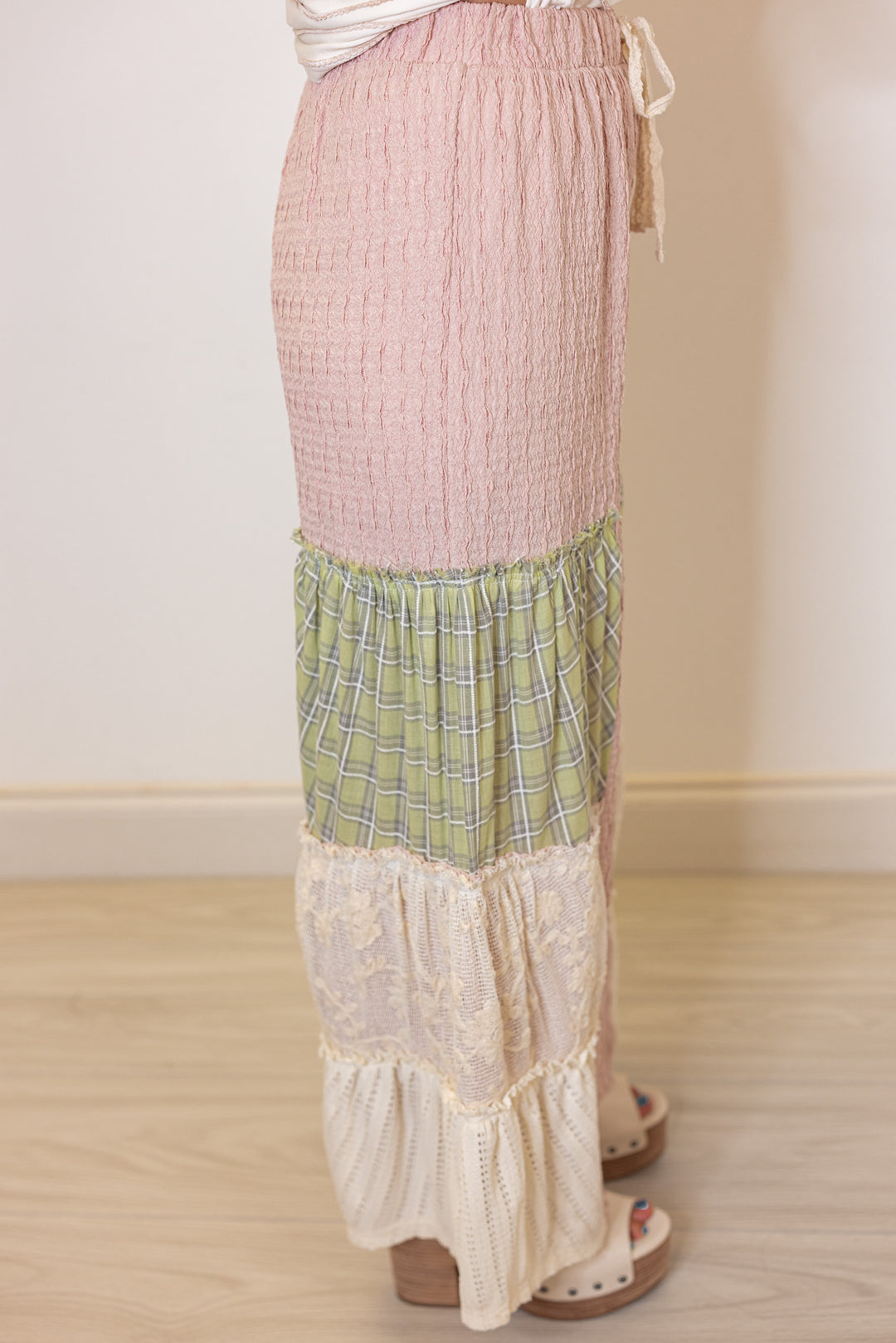 Women's dusty pink wide leg pants with tiered colorblock patches by Fantastic Fawn showing side view