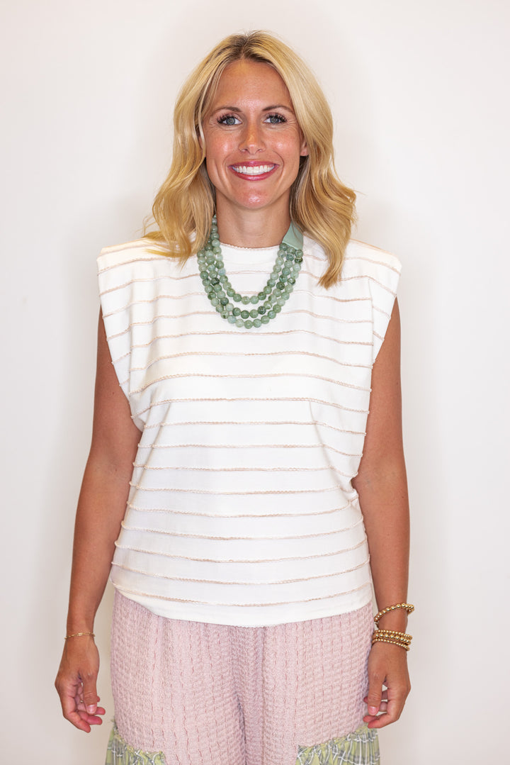 Cream sleeveless knit top with ombre taupe textured wave stripes by Strut and Bolt