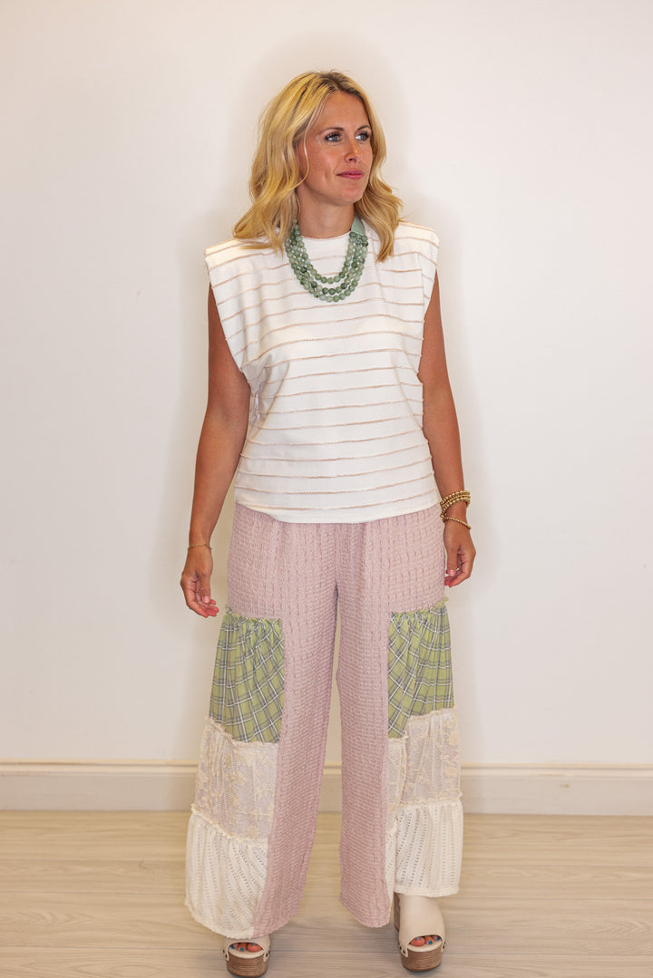 Women's dusty pink wide leg pants with tiered colorblock patches by Fantastic Fawn showing full front view