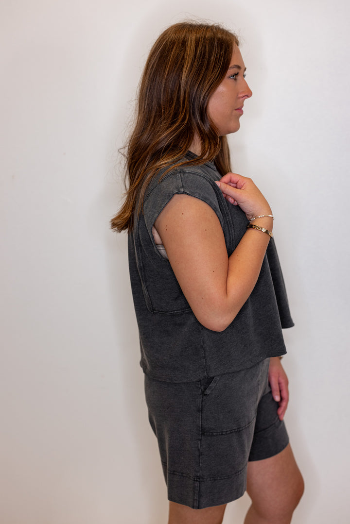 Women's mineral washed black knit sleeveless top by Rae Mode showing side view