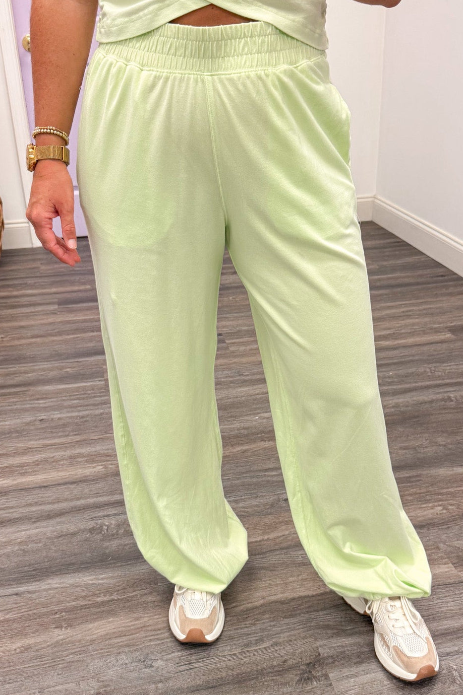 solid mint green sleeveless top and wide leg jogger pants matching athleisure set