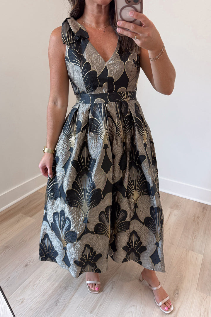 light mocha and black floral print with gold metallic accents sleeveless v neckline midi dress