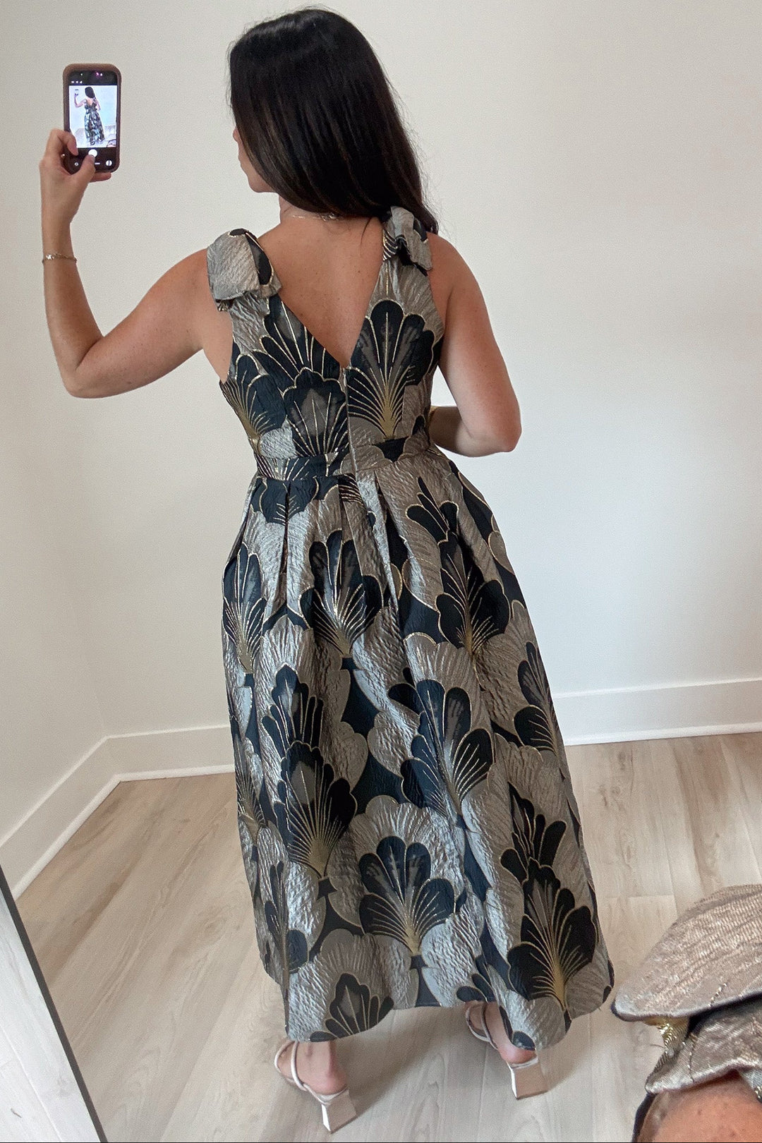 light mocha and black floral print with gold metallic accents sleeveless relaxed silhouette midi dress