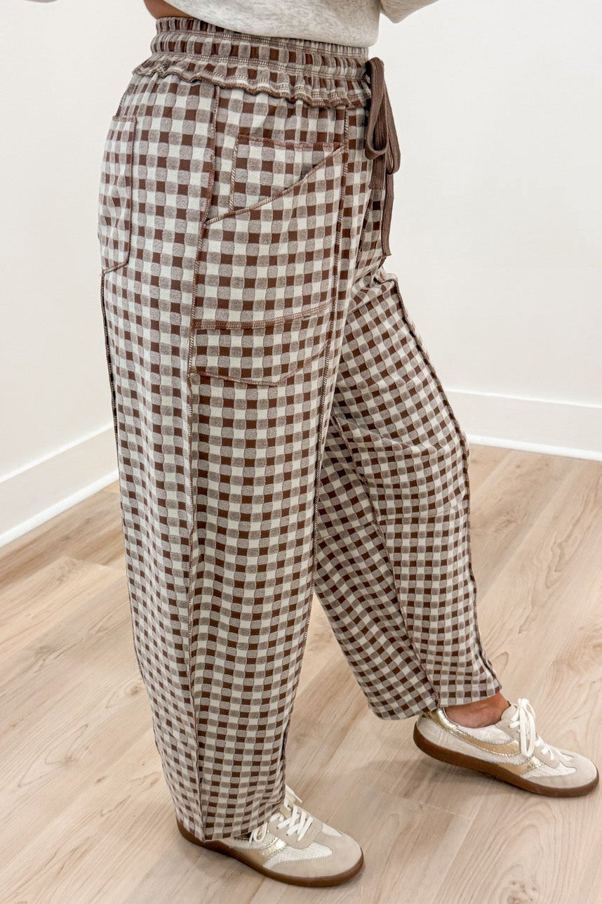 mocha brown and ivory gingham checkered print knit barrel leg pants with reverse seam details