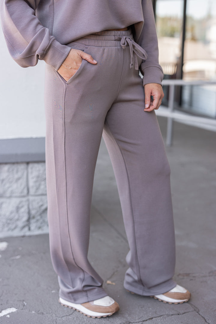 Mocha scuba knit straight leg elastic waist pants by Rae Mode showing side view