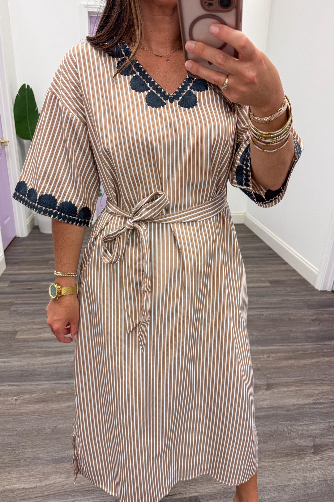 mocha and white striped with navy blue embroidered trim details v neckline belted midi dress