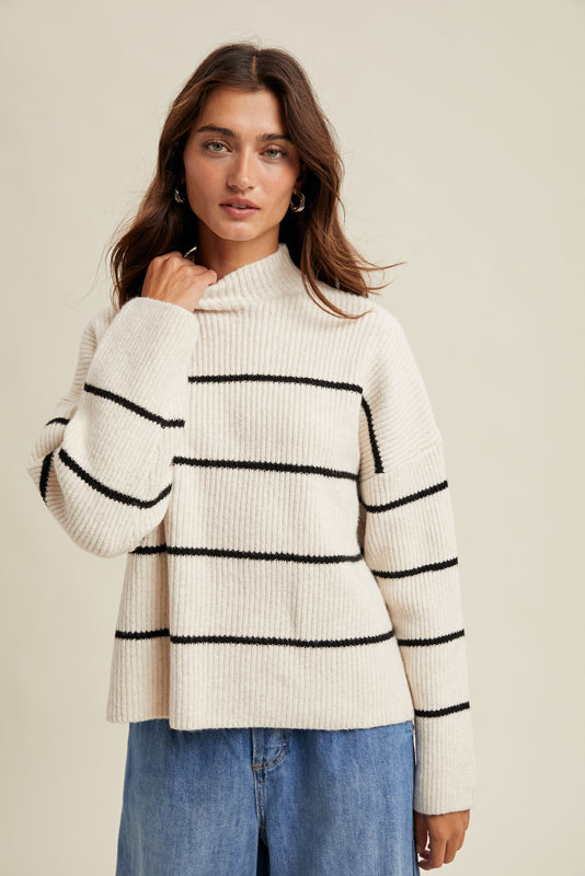 ribbed striped mock neck black ivory sweater up close